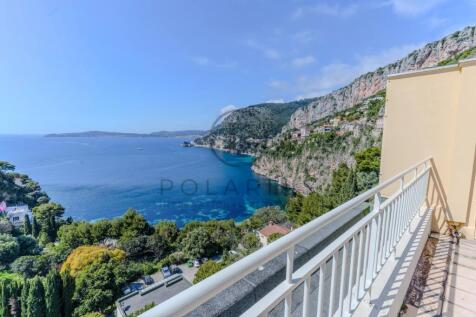 Enjoy stunning lake views from the balcony of this