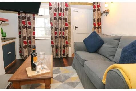 Living room with front door.jpg