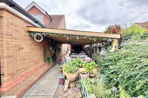 Covered outdoor living area view 3
