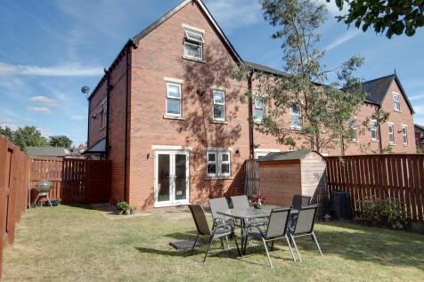 Back garden and the rear of the house