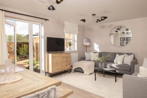 Living and dining room in the 3 bed Portmore show home