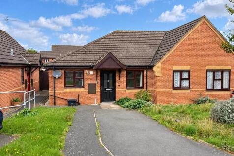 sunny_suburban_bungalow_frontage.jpg
