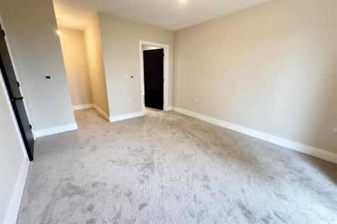 bedroom one with dressing area