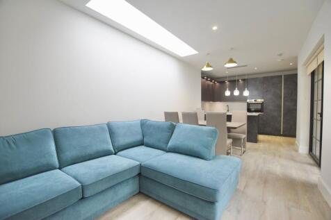 Presenting a rare opportunity to rent this brand new, top-of-the-range 3-bedroom, 2-bathroom ground floor flat, set within a striking architectural development on the prestigious Hampton Road, right i