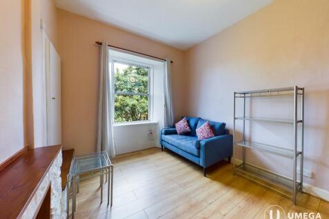 Well-presented, fully furnished one-bedroom third-floor apartment offering bright and spacious accommodation. Features a generous open-plan kitchen/living area and a separate box room, ideal for a hom