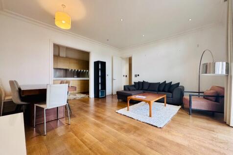 Modern 2-bedroom, 2-bathroom apartment in the prestigious development, Goodman's Field E1, with a balcony overlooking beautifully landscaped communal gardens. Features a spacious living area, fully fi