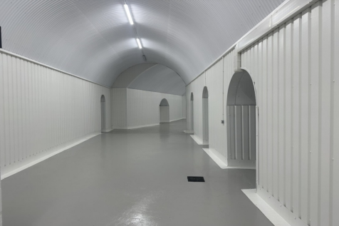 An empty arch with white lining