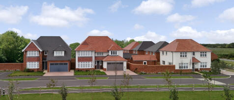 Redrow Hamlet Park street scene featuring detached homes