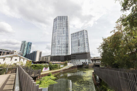 One bedroom apartment in Capital Towers with dual aspect living space, large windows and city views. Features integrated kitchen with modern appliances. Residents benefit from concierge, on site gym a
