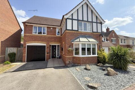 DRIVEWAY AND FRONT GARDEN