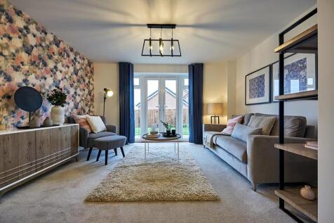 The spacious lounge with French doors