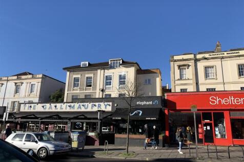 Vibrant local high street with shops and cafes...
