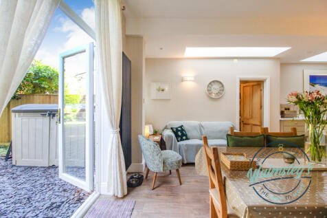 French doors from family room to gardens