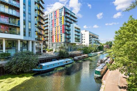 This stunning new-build apartment offers contemporary living at its finest, featuring three generous double bedrooms, two stylish bathrooms (including a beautiful en-suite), and an additional guest WC