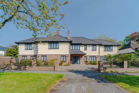 An exceptional detached house finished to an exacting standard and situated in a highly desirable location. Accommodation extending in all to an impressive 6,100 sq ft (567 sq m) and including 3 recep