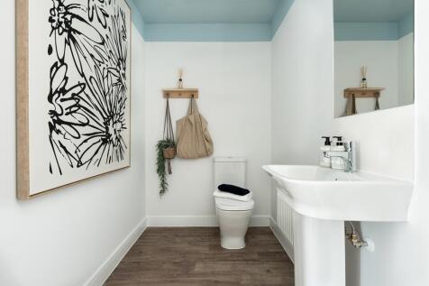 Handy downstairs cloakroom- typical Taylor Wimpey home