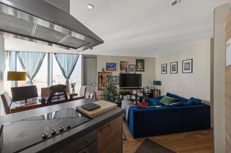A bright furnished one-bedroom apartment in a contemporary riverside development, offering sweeping views towards Canary Wharf, The O2, and partial river glimpses. With 24-hour concierge, integrated a