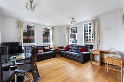 Spacious two double bedroom two bathroom apartment set in this portered development in The City. This bright apartment has a triple aspect living room, two double bedrooms, two bathrooms (one en-suite