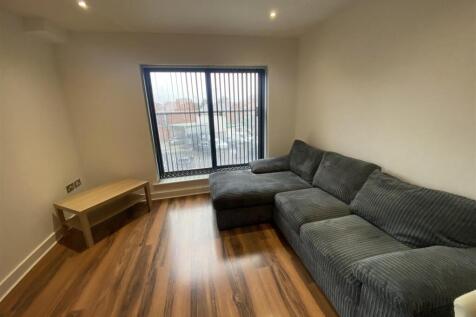 Welcome to this modern apartment located at Southpoint, 12 Lane End Road in the vibrant area of Burnage, Manchester. This delightful property offers a comfortable living space, perfect for individuals