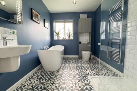 FAMILY BATH AND SHOWER ROOM