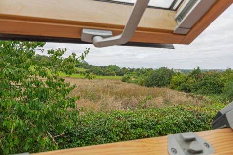 Velux to the front and rear with countryside views