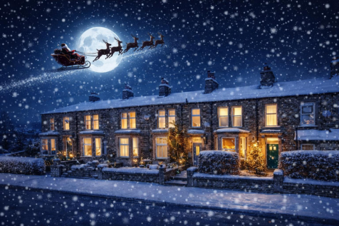 Santa over snowy British terraced houses.png