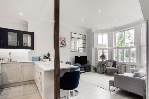 **NEW TO MARKET** This modern two bedroom apartment (602sqft) on Willesden Lane offers a stylish open-plan living space with contemporary finishes. The bright living area features large windows and fl