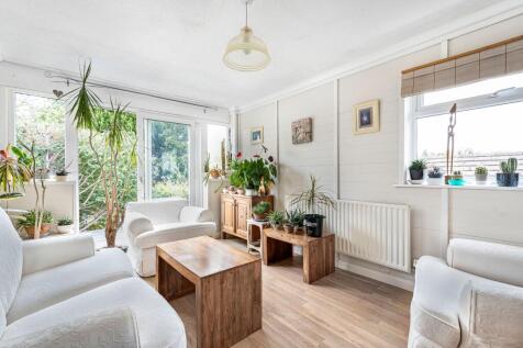Living room with patio doors onto decking