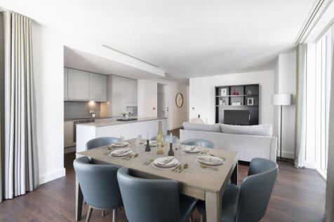 Explore this chic open-concept space, designed for seamless living and entertaining.