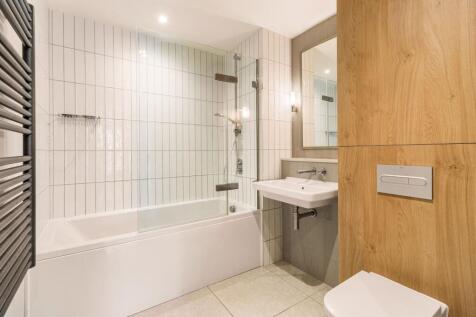 Experience elegance in this beautifully designed bathroom, where modern meets comfort.