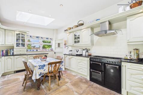 Kitchen with dining space and skylight