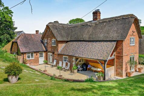 Cottage On The Bank