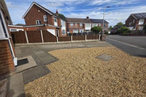 Front Garden to Driveway