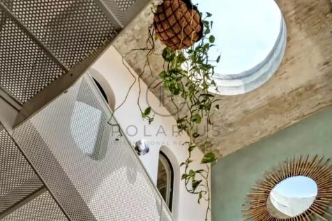 Bright and airy interior with high ceilings and lu