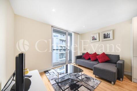A one bedroom apartment with a private balcony in Lanterns Court, a modern development on the Isle of Dogs, Canary Wharf E14. The light open-plan kitchen/living and dining area features a fully integr