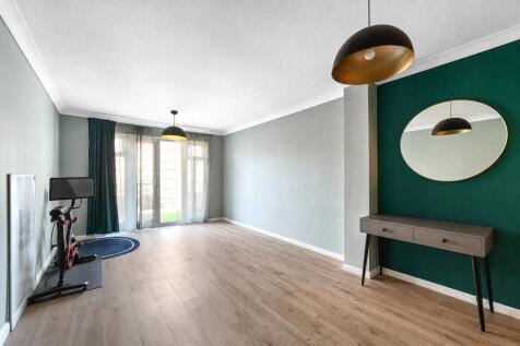 Offered chain-free, this well-presented two-bedroom split-level apartment with a private garden is ideally situated just moments from Hackney Wick Station. The accommodation comprises two generous dou