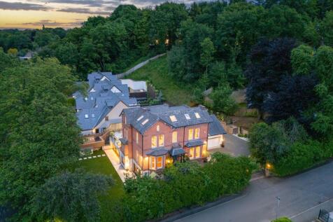 Luxurious 6-bed home on a private plot just under half an acre, blending period elegance with modern style, top spec features, and stunning gardens near Prestwich Village.