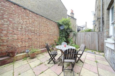 A two bedroom flat with access to a garden and close to all transport links.