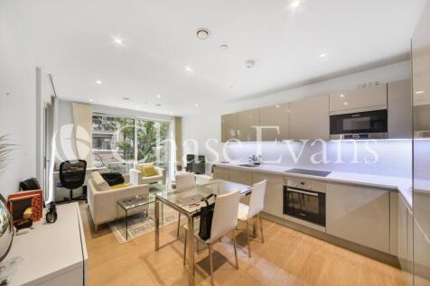 Modern one bedroom apartment in Baldwin Point, Elephant Park SE17. Comprising a modern, fully fitted kitchen with integrated appliances and a charming living space with full-height windows opening to