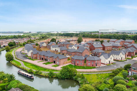 Waterside aerial view over the development