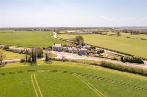 Surrounded by open farmland
