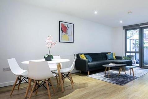 Experience the allure of this stylish and spacious living area, perfect for modern home enthusiasts.