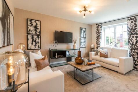 The bright lounge overlooks the front of the home