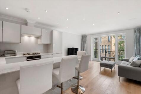 SHORT LET - Beautifully refurbished and particularly spacious,two bedroom apartment boasting c936sqft of living space, two balconies with attractive views. Located moments from Kings Cross Tube.