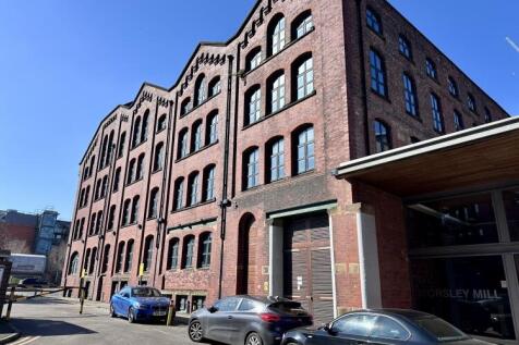 This corner position, two bedroom duplex apartment is situated on the third floor of the development and retains many of the buildings original features to include pitched ceilings with exposed wooden