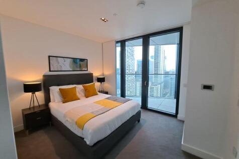 This fully furnished one-bedroom apartment is situated on the 24th floor of Amory Tower, offering stunning views of Canary Wharf and beyond. The apartment features an open-plan living area with a kitc