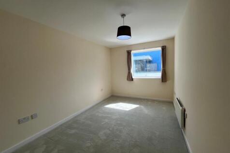 Welcome to this charming modern unfurnished apartment located at Europa, 53 Sherborne Street. This delightful one-bedroom property has been newly decorated, offering a fresh and inviting atmosphere fo