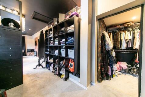 Bedroom 1 dressing area and walk in w...