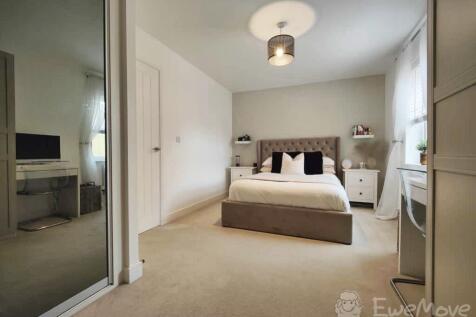Master bedroom with built-in wardrobes