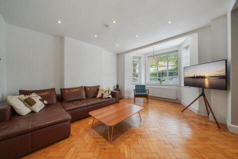 Bright and Spacious Three Bedroom Apartment Moments from Hampstead Heath.This substantial three bedroom ground floor apartment features an impressive 25 ft double aspect reception and dining room with